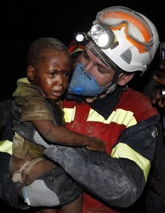 A child rescued from the rubble