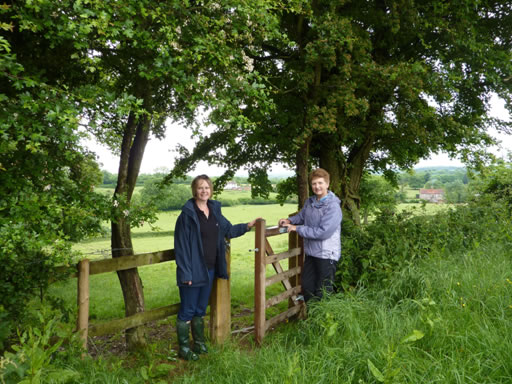 Eve and Janet inspecting a new gate on Hook Valley Farm