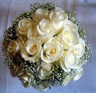 Hand-tied white roses