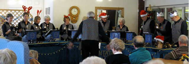 Handbell ringers getting festive