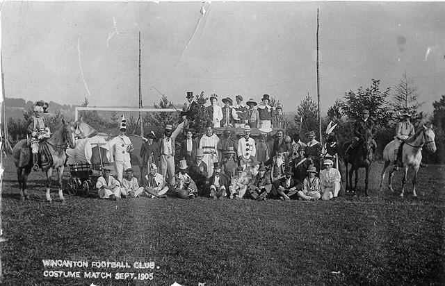 Wincanton football club pose in front of the goal before playing a costume match. Sept. 1905